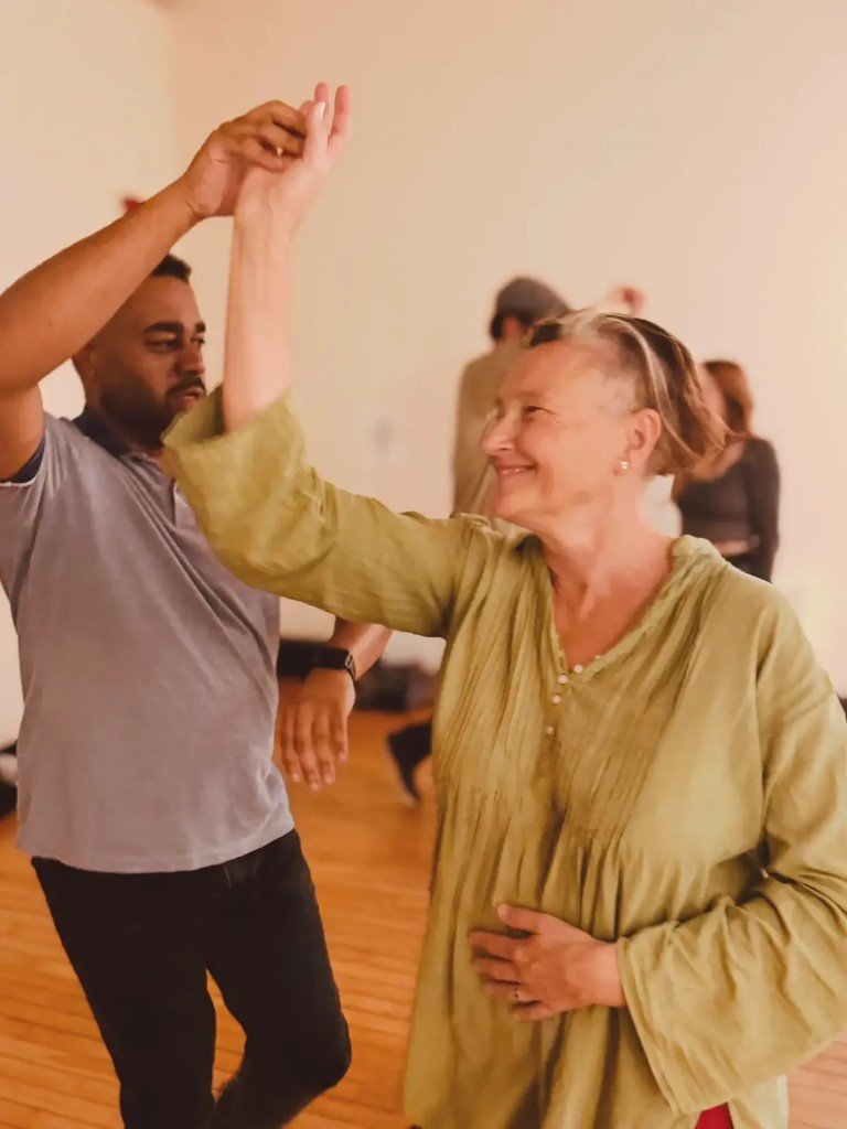 Dancers mid-turn during a Forró class